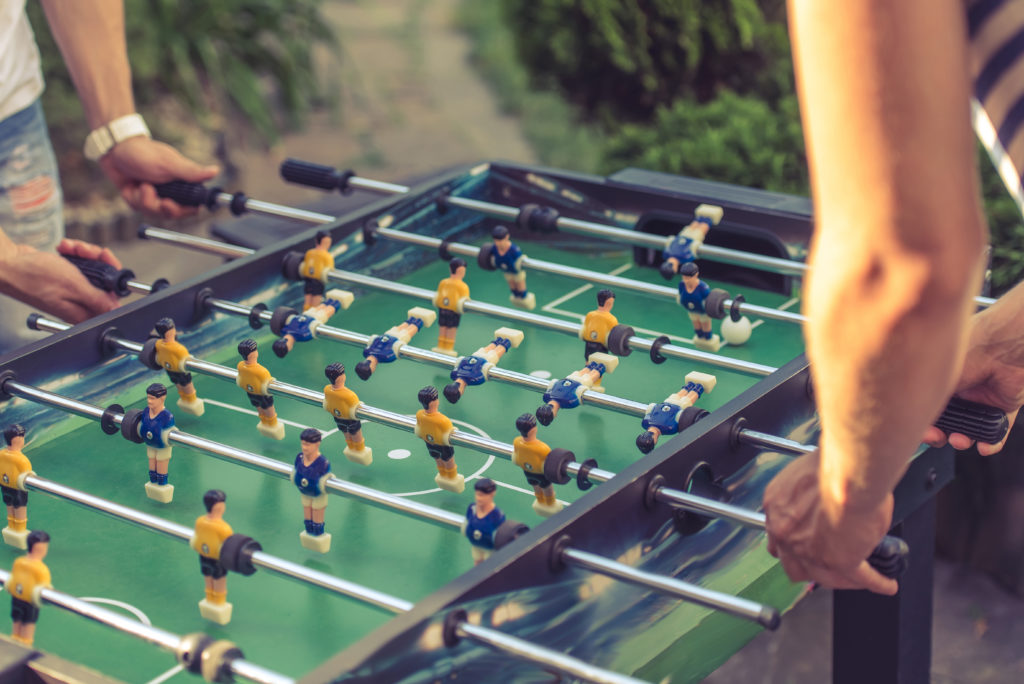 Conflict Arising from Agency Official’s Participation in Competitive Foosball Gatherings Irredeemably Taints Procurement; Teledyne Brown Engineering, Inc., GAO B-418835, B-418835.2